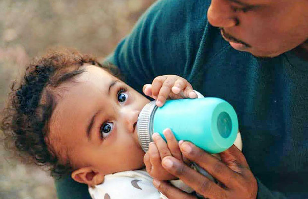 Babies Hold Bottles